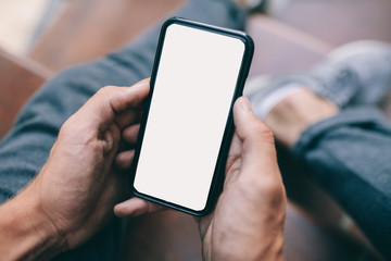 man using his smartphone. blank space for your text