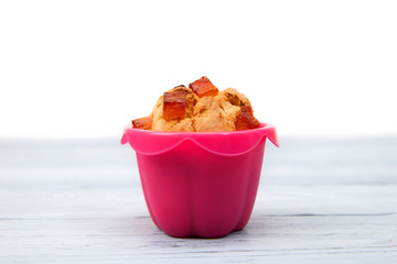 muffin with candied fruits in a baking dish