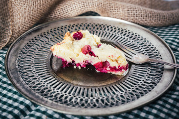 Slice of Cranberry Bar on Metal Plate with Vintage Fork