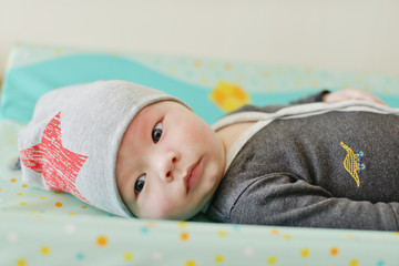 baby on changing table