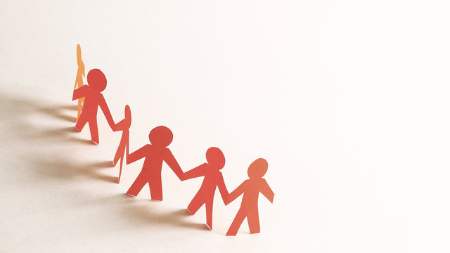 three teams paper men taking each other's hands