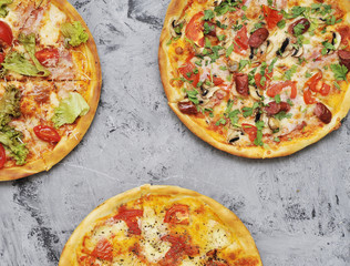 Delicious pizza on stone background.