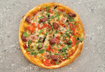 Delicious pizza on stone background.