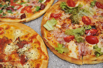Delicious pizza on stone background.