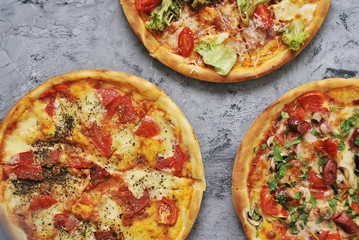 Delicious pizza on stone background.