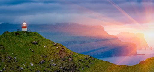 Shot Of Beautiful Panoramic Scene, Kalsoy Island and Kallur lighthouse, Faroe Islands © Ilgov
