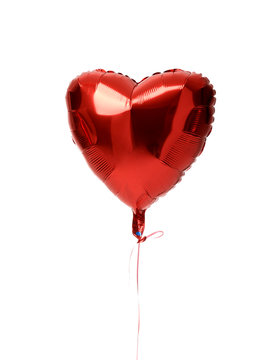 Single red heart balloon object for birthday party or valentines day isolated on a white 