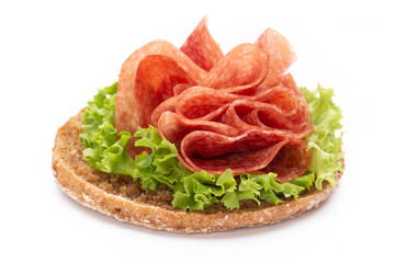 Sandwich with ham sausage on white background.