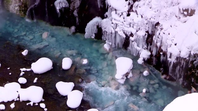 High angle winter view of Whitebeard Falls and Biei River, Japan