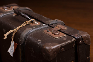 Old suitcases on a wooden floor
