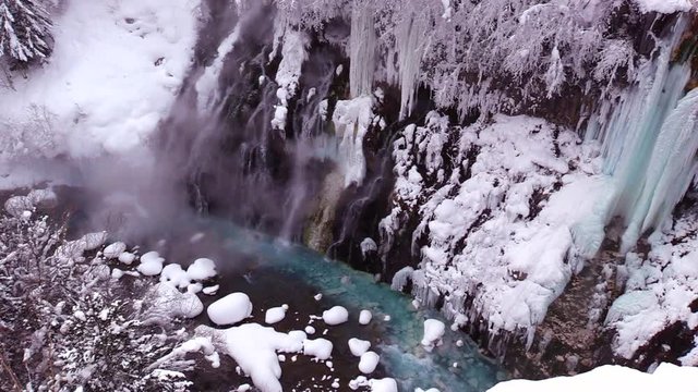 High angle winter view of Whitebeard Falls and Biei River, Japan