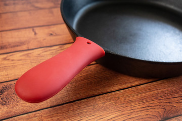 Protect from burning hands with a silicone cover for your cast iron skillet.