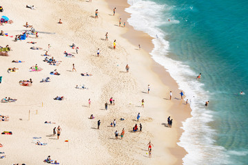 Nazare, Leiria, Portugal - July 01, 2019: Tourists enjoy Nazare Beach, from the viewpoint of Suberco, in the Leiria District, in Portugal.