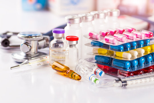 Drug prescription for treatment medication. Pharmaceutical medicament, cure in container for health. Pharmacy theme, capsule pills with medicine antibiotic in packages.