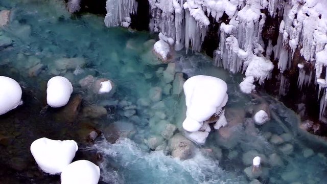 High angle winter view of Whitebeard Falls and Biei River, Japan