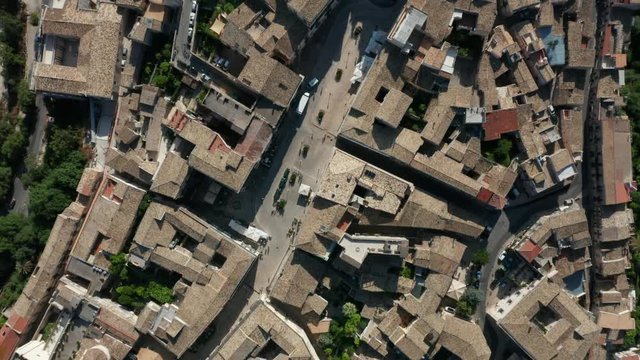 aerial direct overhead shot passing over Ragusa Ibla piazza