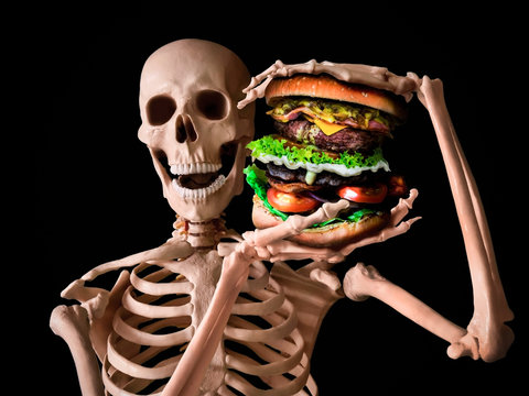 funny skeleton eating deadly junk food Stock Photo | Adobe Stock