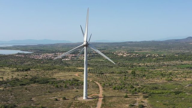 Wind turbines in field corbieres France aerial optical illusion Aude sunny day 