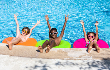 kids smiling and happy at the pool - 281703423