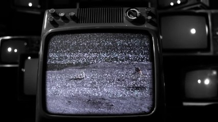 Apollo 16 Mission, Astronauts Driving Rover On the Moon, Seen On a Retro TV. Black and White Tone. Elements of this image furnished by Nasa. - Powered by Adobe