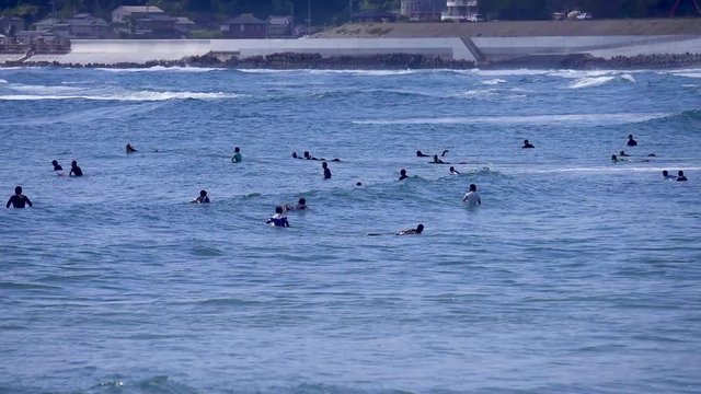Surfers and bathers near Toyoma Beach, Iwaki, Fukushima, Japan