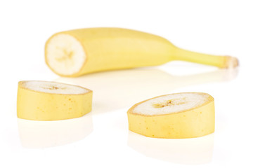 Group of one half two slices of ripe yellow banana isolated on white background