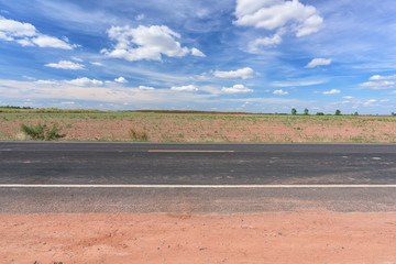 Asphalt road side view and landscape countryside.