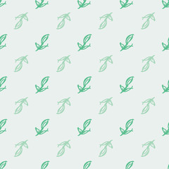 Fresh spring leaf seamless pattern in geometric composition in shades of green with cool, fresh and clean look. Hand drawn leaves for fashion, textile, wrapping paper and wallpapers.