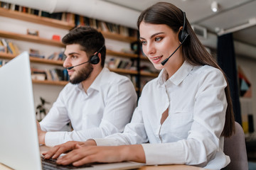 modern call center with diverse workers in the office