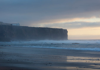 Sagres Point at sunset, cliff, people fishing