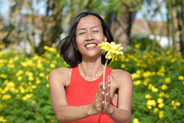 Happy Female Woman With A Flower