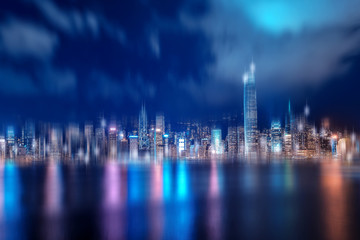 Fototapeta na wymiar Hong Kong cityscape at night. View From Victoria Harbour.