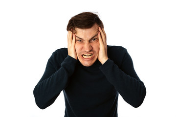 emotional portrait of a crazy man in close-up. concept: the nervous breakdown, mental disease, headaches and migraine. isolated on white background.