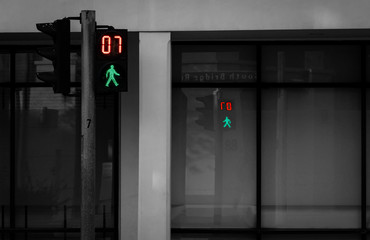 Pedestrian signals on traffic light pole. Pedestrian crossing sign for safe to walk in the city....