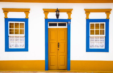 Colorful door and windows of a colonial house in the historical town of Tiradentes, Minas Gerais, Brazil - 281720868