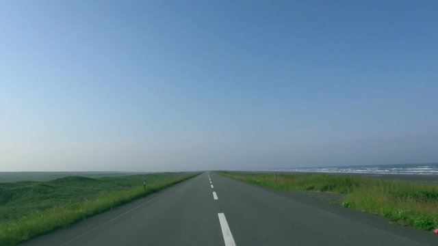 POV shot of empty road on summer day, Sarumo, Hokkaido
