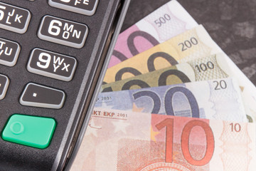 Payment terminal and currencies euro. Cashless or cash paying in different places