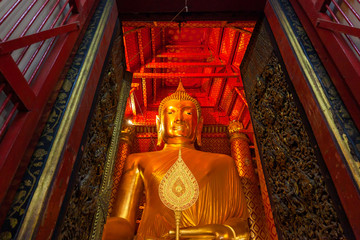 Golden Buddha statue Located in the temple Of Ayutthaya, Thailand
