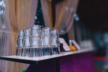 dishes on banquet tables, serving glasses, spoons and plates