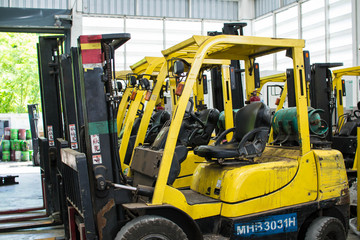 The front wheels of the forklift.