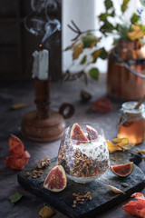 Homemade granola energy bars with figs, oatmeal, almond, dry cranberry and pumpkin seeds, healthy snack, horizontal