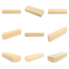 Set of delicious crispy wafers on white background