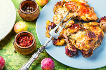 Roasted chicken stuffed with plum