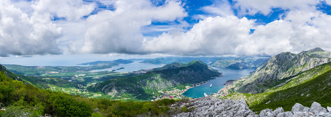 Montenegro, XXL panorama of azure waters of fjord in kotor bay with two cruise ships anchoring in...