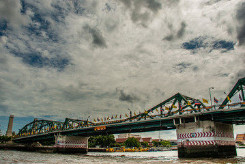 Phra Phuttha Yodfa Bridge (Memorial Bridge) is a bridge over the Chao Phraya River connecting the districts Phra Nakhon and Thonburi, Can be opened to larger ships, Vintage Style.