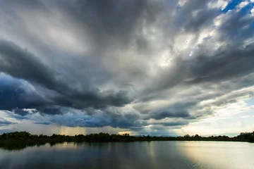 Foto op Canvas thunder storm sky Rain clouds © freedom_naruk