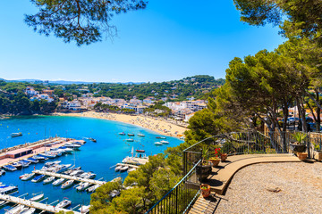 View of port with boats in Llafranc town, Costa Brava, Spain