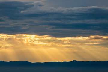 colorful dramatic sky with cloud at sunset.
