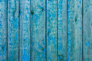 Old painted wooden boards. Old wooden fence. Background.