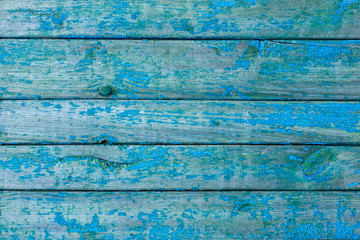 Old painted wooden boards. Old wooden fence. Background.